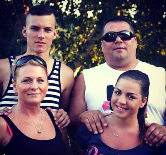 Lukas Haraslin with his parents and sister.